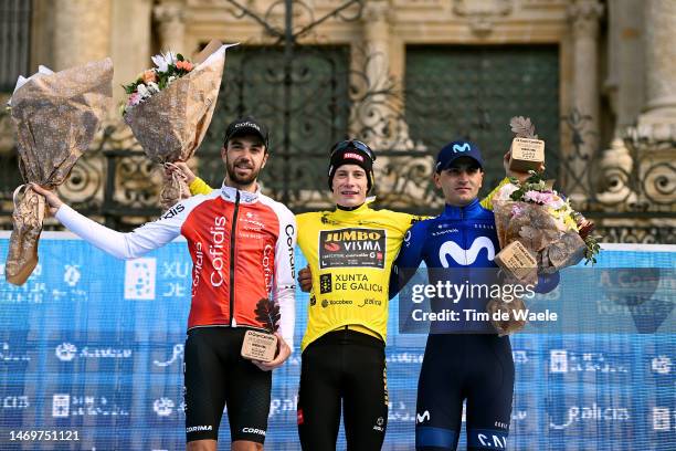 Jesús Herrada of Spain and Team Cofidis on third place, race winner Jonas Vingegaard of Denmark and Team Jumbo-Visma - Yellow Leader Jersey and Ruben...