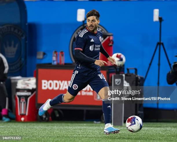 Carles Gil of New England Revolution scans the field during a game between New England Revolution and Charlotte FC at Bank of America Stadium on...