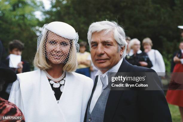 Gunter Sachs and his wife Mirja Larsson. They are attending the wedding ceremony of Count Leopold von Bismarck and his bride Debonnaire Jane...