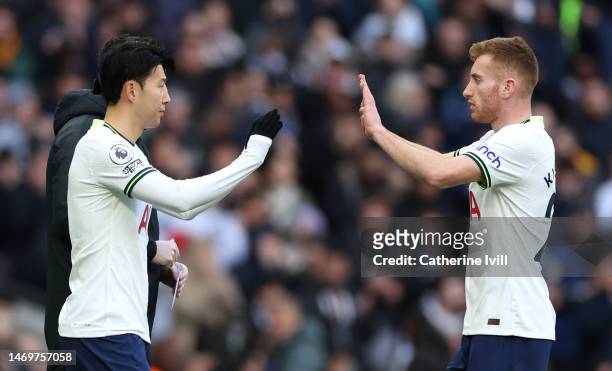 Dejan Kulusevski of Tottenham Hotspur is replaced by teammate Son Heung-Min during the Premier League match between Tottenham Hotspur and Chelsea FC...