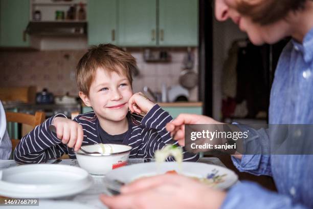 kid having a lunch with his mother - elementary student stock pictures, royalty-free photos & images