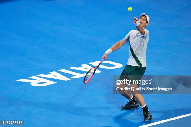 Andy Murray of Great Britain serves against Daniil Medvedev of Russia in their Men's Singles Final match on day five of the Qatar ExxonMobil Open at...