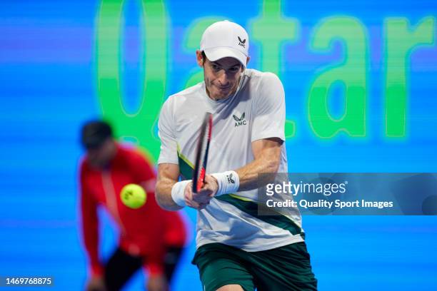 Andy Murray of Great Britain returns a ball against Daniil Medvedev of Russia in their Men's Singles Final match on day five of the Qatar ExxonMobil...