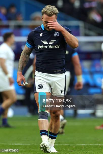 Stuart Hogg of Scotland looks dejected following the team's defeat in the Six Nations Rugby match between France and Scotland at Stade de France on...