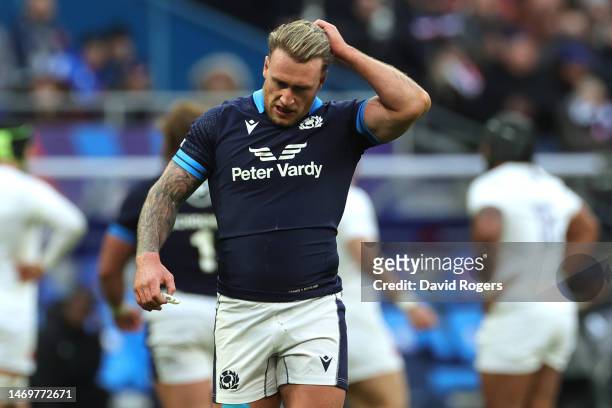 Stuart Hogg of Scotland looks dejected following the team's defeat in the Six Nations Rugby match between France and Scotland at Stade de France on...