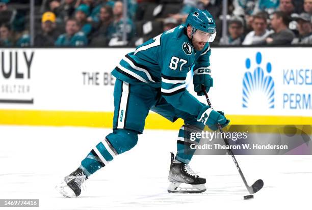 Martin Kaut of the San Jose Sharks skates with the puck against the Chicago Blackhawks during the second period at SAP Center on February 25, 2023 in...