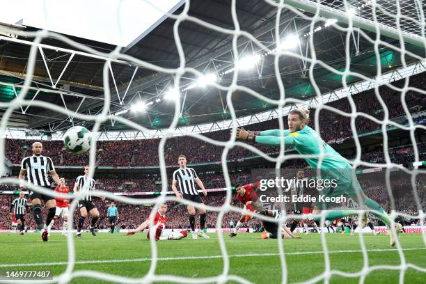 Loris Karius of Newcastle United fails to save the Manchester United first goal scored by Casemiro of Manchester United during the Carabao Cup Final...