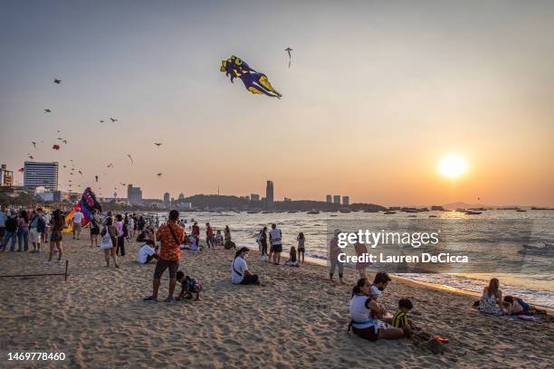 Beachgoers fly kites during the International Kite on the Beach Festival on Central Pattaya Beach on February 26, 2023 in Pattaya, Thailand. Pattaya...