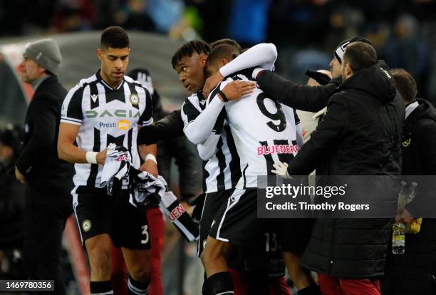 Destiny Udogie celebrates with Beto after the first half equaliser during the Serie A match between Udinese Calcio and Spezia Calcio at the Dacia...