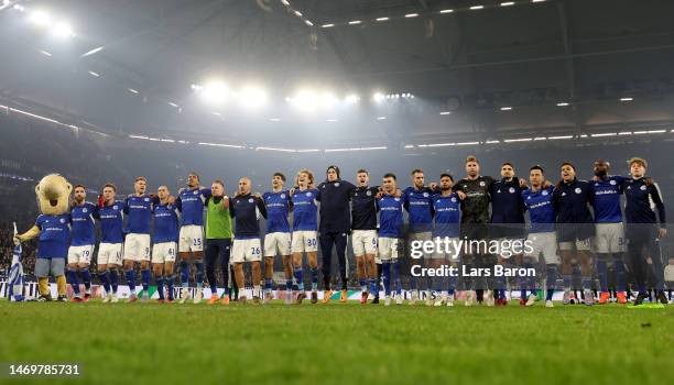 Players of Schalke celebrate with their fans after winning the Bundesliga match between FC Schalke 04 and VfB Stuttgart at Veltins-Arena on February...