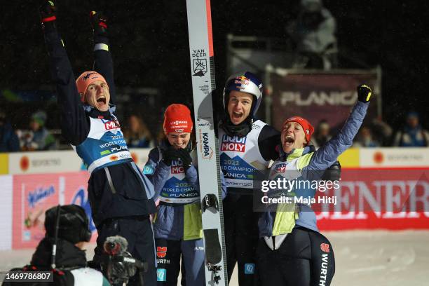 Team Germany celebrate victory in the Ski Jumping Mixed Team HS100 at the FIS Nordic World Ski Championships Planica on February 26, 2023 in Planica,...