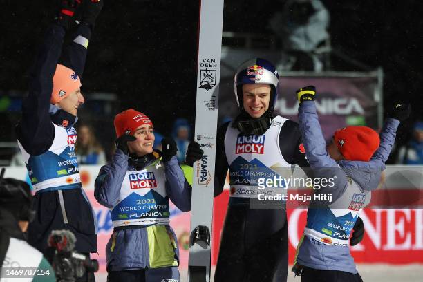 Team Germany celebrate victory in the Ski Jumping Mixed Team HS100 at the FIS Nordic World Ski Championships Planica on February 26, 2023 in Planica,...