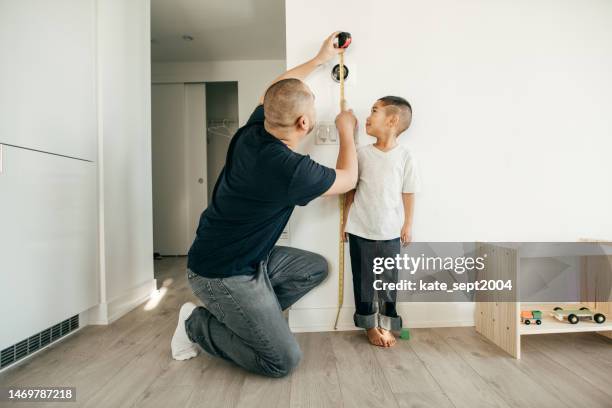 growth development of a child - fathers day tools stock pictures, royalty-free photos & images