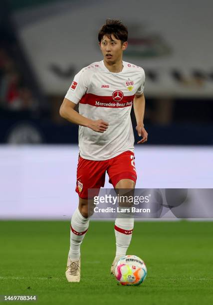Hiroki Ito of Stuttgart runs with the ball during the Bundesliga match between FC Schalke 04 and VfB Stuttgart at Veltins-Arena on February 25, 2023...