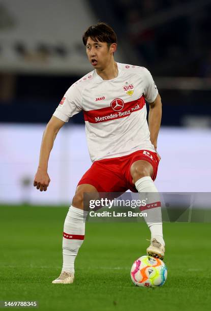 Hiroki Ito of Stuttgart runs with the ball during the Bundesliga match between FC Schalke 04 and VfB Stuttgart at Veltins-Arena on February 25, 2023...