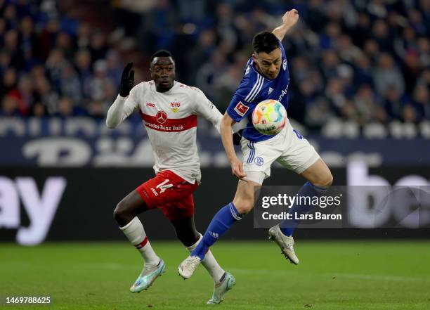 Silas of Stuttgart challenges Maya Yoshida of Schalke during the Bundesliga match between FC Schalke 04 and VfB Stuttgart at Veltins-Arena on...