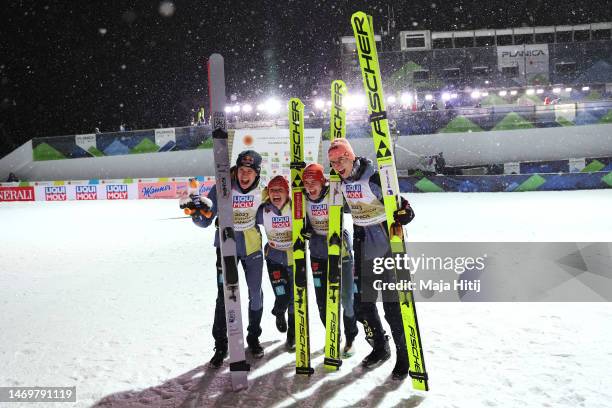 Team Germany celebrate after the victory ceremony in the Ski Jumping Mixed Team HS100 at the FIS Nordic World Ski Championships Planica on February...