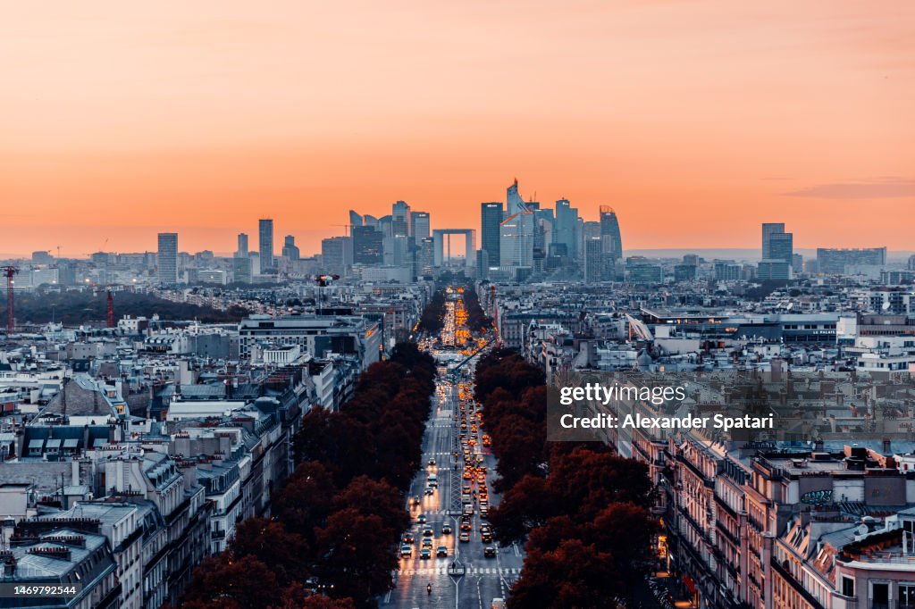 Avenue des Champs-Élysées illuminated at sunset, aerial view, Paris, France