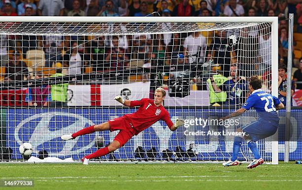Alessandro Diamanti of Italy scores the winning penalty past Joe Hart of England during the UEFA EURO 2012 quarter final match between England and...
