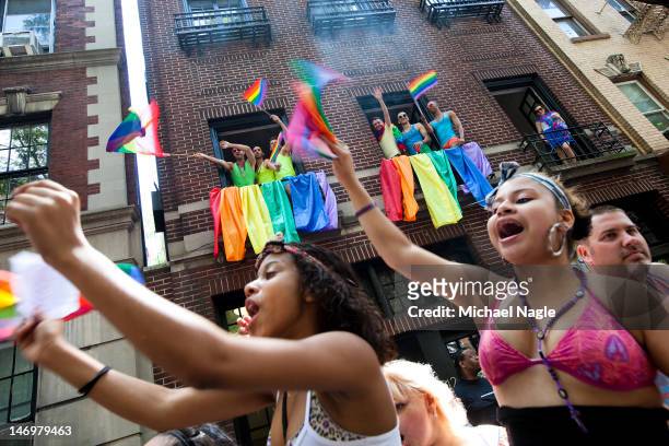 Revelers cheer during the New York City Gay Pride March on June 24, 2012 in New York City. The annual civil rights demonstration commemorates the...
