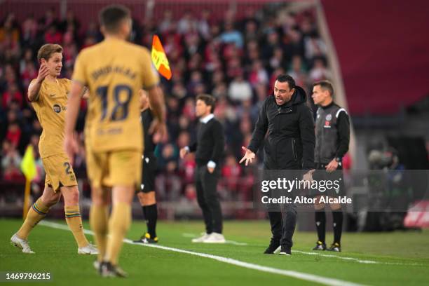 Xavi, Head Coach of FC Barcelona, reacts during the LaLiga Santander match between UD Almeria and FC Barcelona at Juegos Mediterraneos on February...