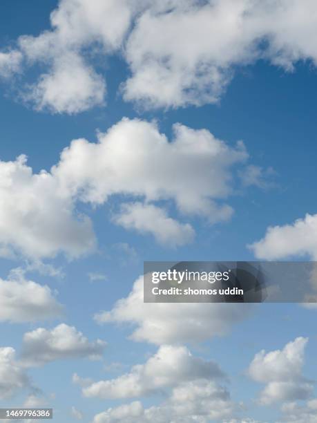 white cumulus clouds up in sky - cloudscape stock pictures, royalty-free photos & images