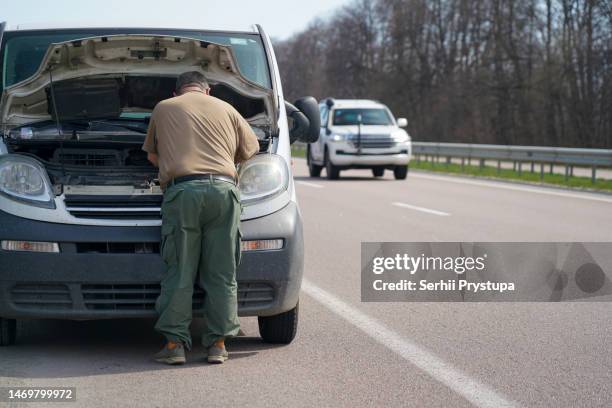 Breakdown Mechanic 22,865 Broken Down Vehicle Stock Photos, High-Res Pictures, and Images ...