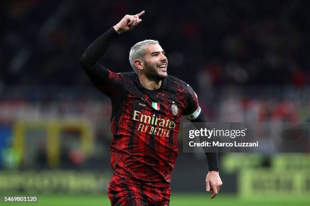 Theo Hernandez of AC Milan celebrates after their shot is deflected into the goal by Juan Musso of Atalanta BC which results in the first goal for AC...