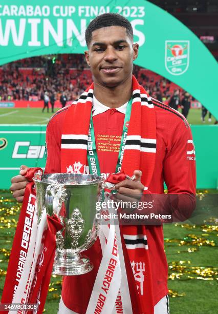 Marcus Rashford of Manchester United celebrate with the trophy after the Carabao Cup Final match between Manchester United and Newcastle United at...