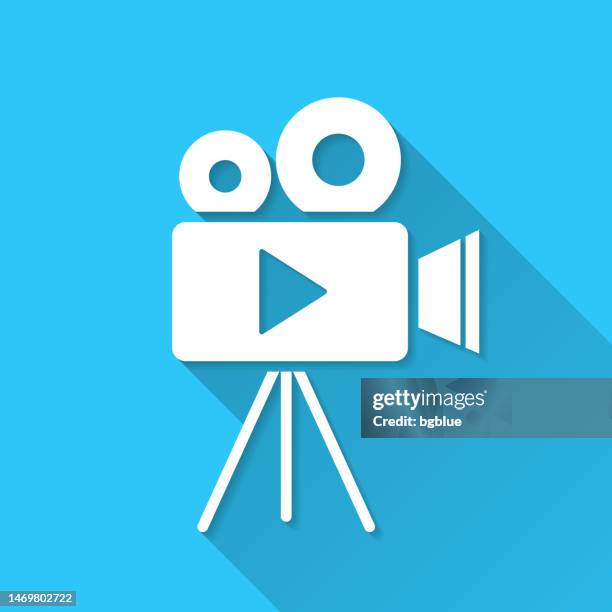 video camera with tripod. icon on blue background - flat design with long shadow - producer icon stock illustrations