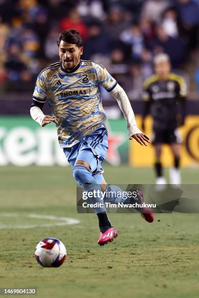 Julián Carranza of Philadelphia Union dribbles against Columbus Crew at Subaru Park on February 25, 2023 in Chester, Pennsylvania.