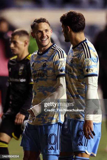 Déniel Gazdag and Julián Carranza of Philadelphia Union speak during the first half against Columbus Crew at Subaru Park on February 25, 2023 in...