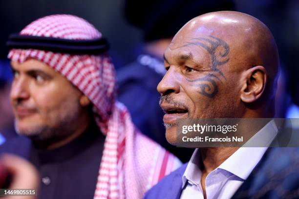 Former Boxer Mike Tyson looks on prior to the Cruiserweight Title fight between Jake Paul and Tommy Fury at the Diriyah Arena on February 26, 2023 in...