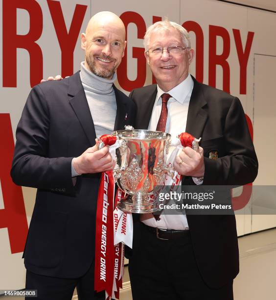 Manager Erik ten Hag and Sir Alex Ferguson of Manchester United celebrate in the dressing room after the Carabao Cup Final match between Manchester...