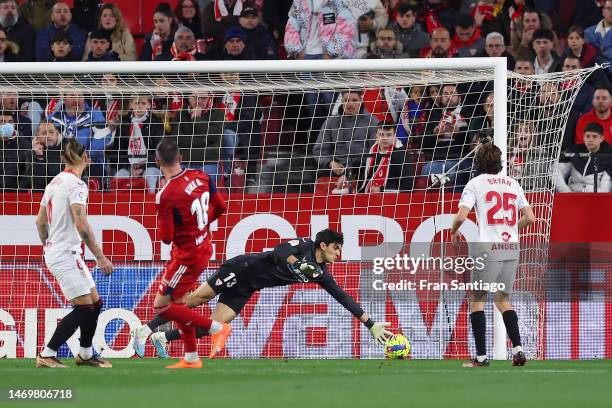 Yassine Bounou of Sevilla FC saves a shot from Kike of CA Osasuna during the LaLiga Santander match between Sevilla FC and CA Osasuna at Estadio...
