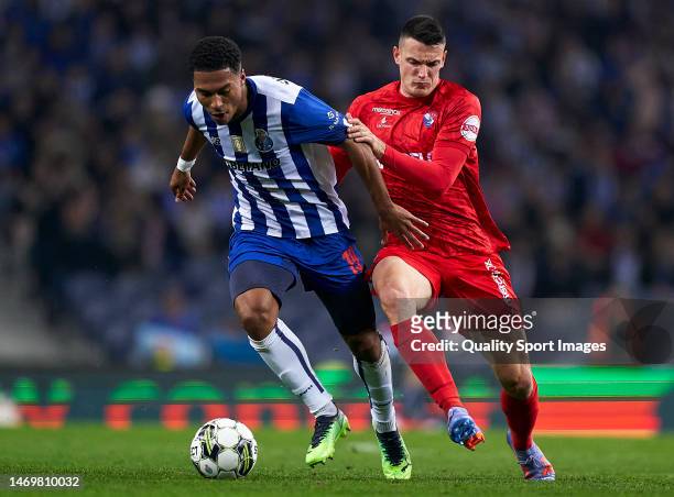 Adrian Marin of Gil Vicente competes for the ball with Danny Namaso of FC Porto during the Liga Portugal Bwin match between FC Porto and Gil Vicente...