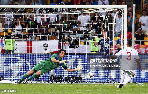 Gianluigi Buffon of Italy saves a penalty from Ashley Cole of England during the UEFA EURO 2012 quarter final match between England and Italy at The...