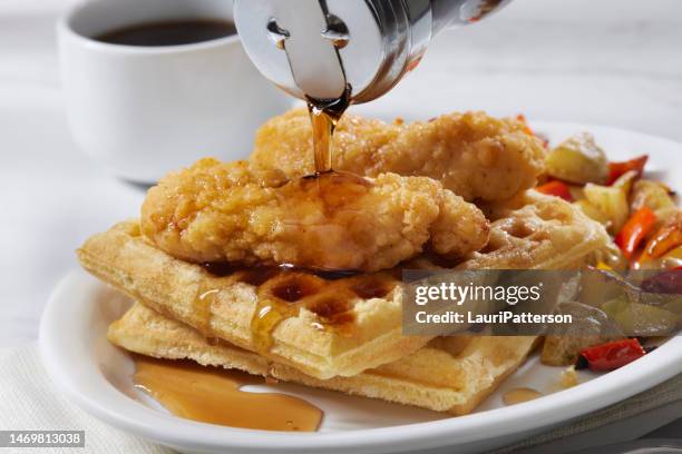 fried chicken tenders with buttermilk waffles - fried chicken white background stock pictures, royalty-free photos & images