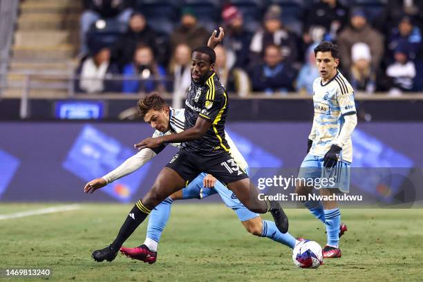 Kai Wagner of Philadelphia Union and Kevin Molino of Columbus Crew challenge for the ball at Subaru Park on February 25, 2023 in Chester,...