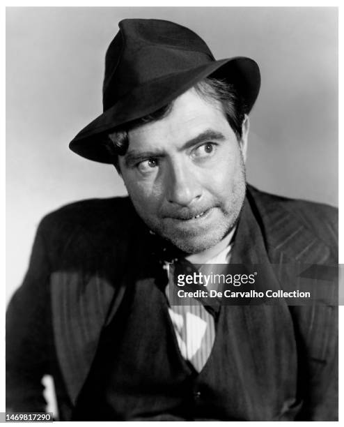 Publicity portrait of British actor Robert Newton in the film 'Kiss the Blood Off My Hands' United States.