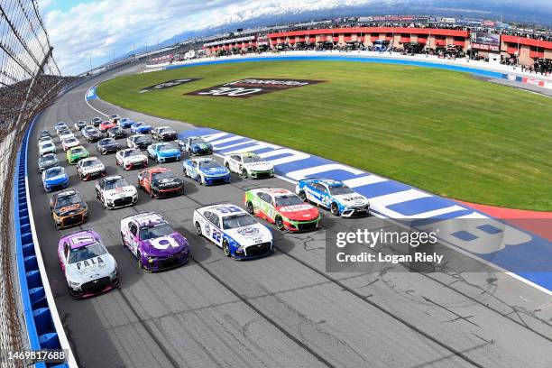 Christopher Bell, driver of the Sirius XM Toyota, Ricky Stenhouse Jr, driver of the Ralphs/Tree Top Chevrolet, Joey Logano, driver of the AAA...