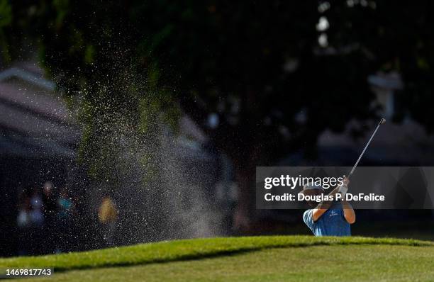 Chris Kirk of the United States hits his second shot on the 12th hole during the final round of The Honda Classic at PGA National Resort And Spa on...