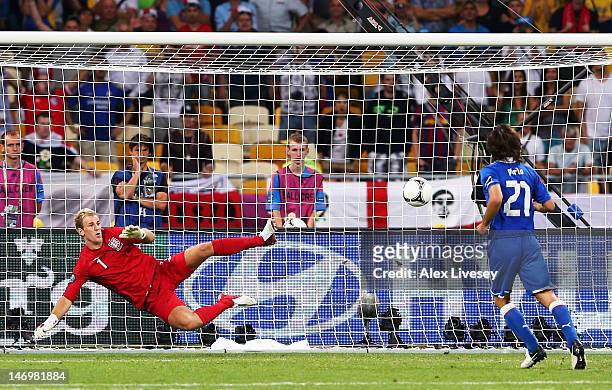 Andrea Pirlo of Italy chips the ball in the penalty shootout past Joe Hart of England during the UEFA EURO 2012 quarter final match between England...