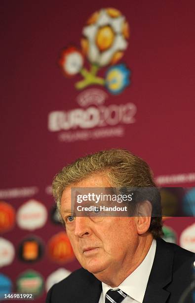 In this handout image provided by UEFA, Coach Roy Hodgson of England talks to the media after the UEFA EURO 2012 Quarter Final match between England...
