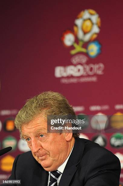 In this handout image provided by UEFA, Coach Roy Hodgson of England talks to the media after the UEFA EURO 2012 Quarter Final match between England...