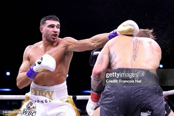 Tommy Fury punches Jake Paul during the Cruiserweight Title fight between Jake Paul and Tommy Fury at the Diriyah Arena on February 26, 2023 in...