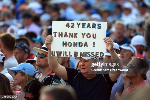 Ha patron holds a sign during the final round of The Honda Classic at PGA National Resort And Spa on February 26, 2023 in Palm Beach Gardens, Florida.