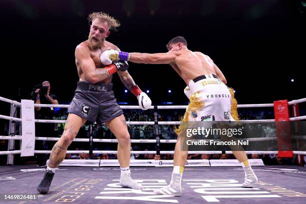 Tommy Fury punches Jake Paul during the Cruiserweight Title fight between Jake Paul and Tommy Fury at the Diriyah Arena on February 26, 2023 in...