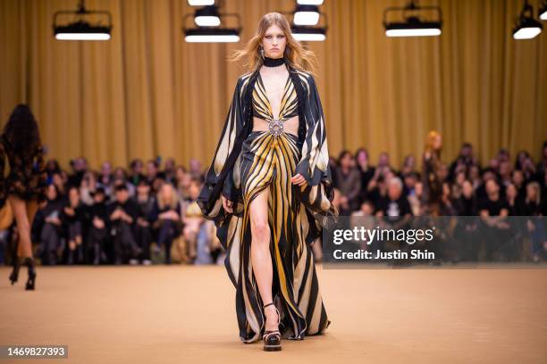 Model walks the runway at the Roberto Cavalli fashion show during the Milan Fashion Week Womenswear Fall/Winter 2023/2024 on February 22, 2023 in...