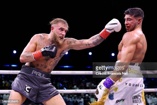 Jake Paul punches Tommy Fury during the Cruiserweight Title fight between Jake Paul and Tommy Fury at the Diriyah Arena on February 26, 2023 in...